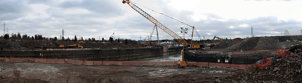 Mucking the blast debris from the rock plug explosion